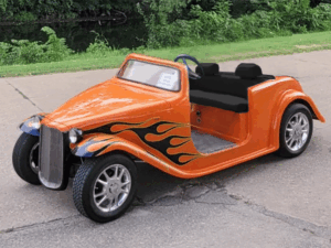 Orange California Roadster With Black Flames golf cart maintenance, cabo san lucas golf cart service